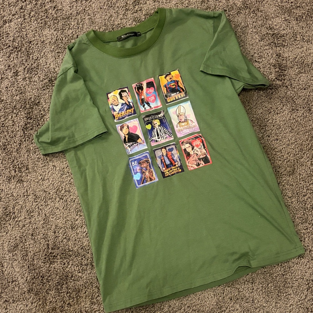 Green Graphic T-Shirt featuring 80’s movies